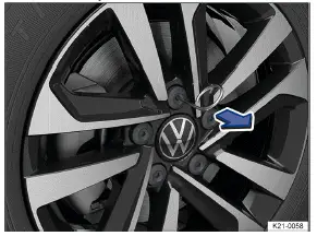 Volkswagen ID.3 - Fig. 1 Retrait des capuchons de boulons de roue