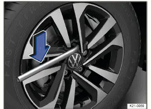 Volkswagen ID.3 - Fig. 1 Desserrage des boulons de roue